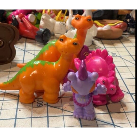 McDonald's Other - McDonalds vintage DINOSAUR Happy Meal pvc figure bundle 4 pcs 209
